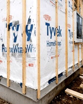 House wrap and strapping prepared before siding goes on